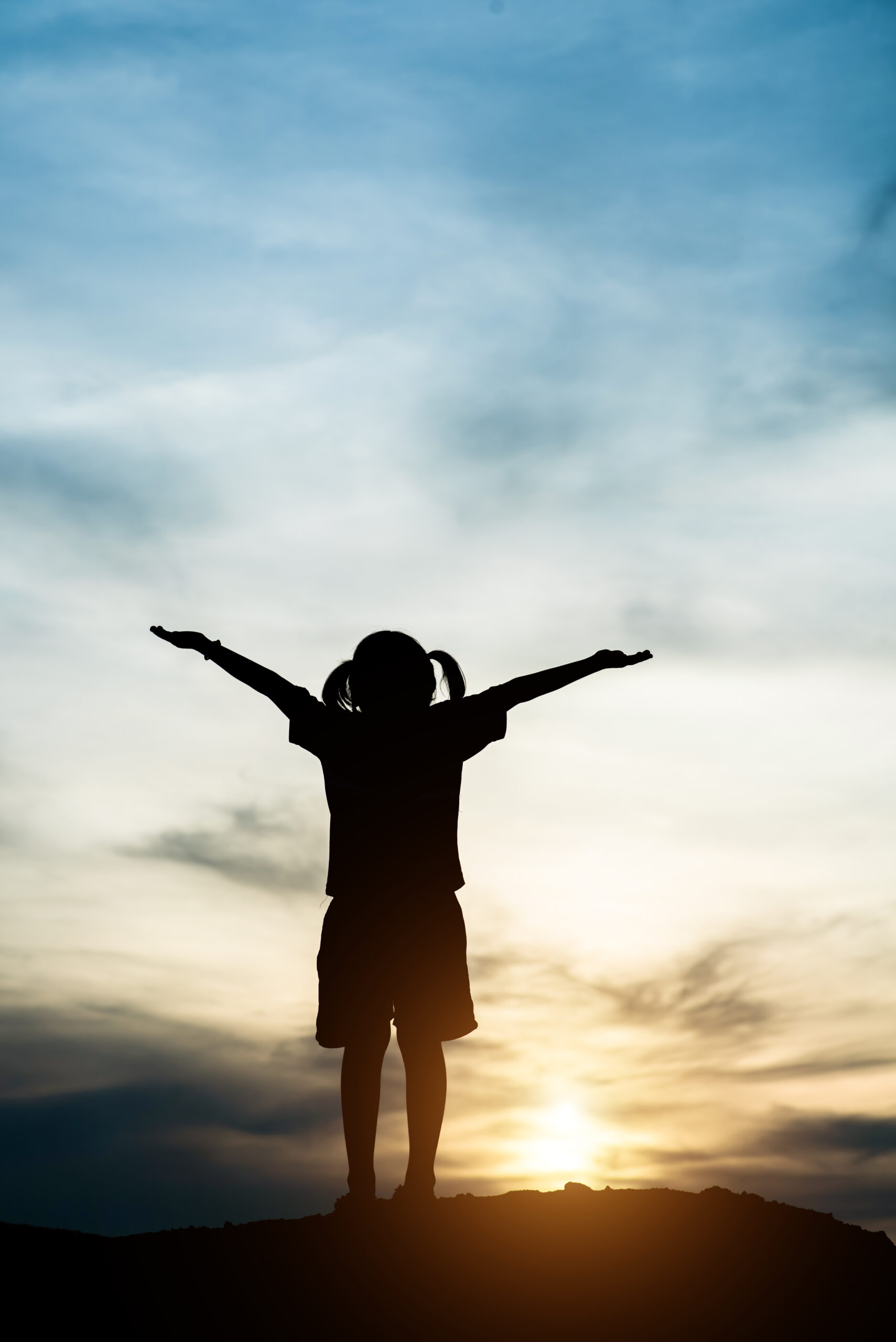 Silhouette Of Little Girl Raising Hand To Freedom Happy Time